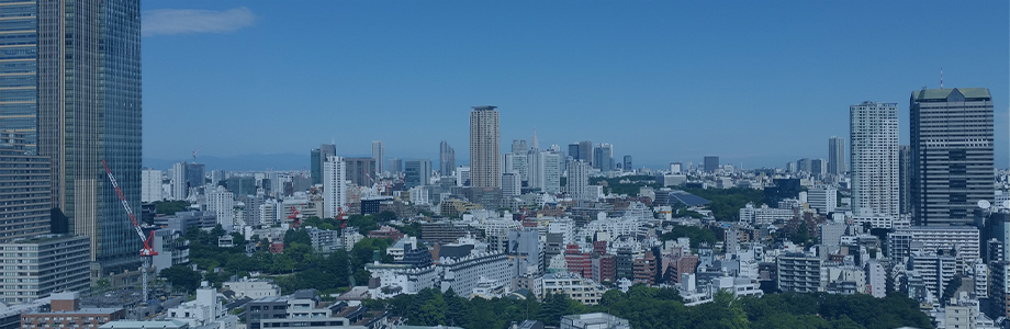 建物と緑が広がる都市のイメージ